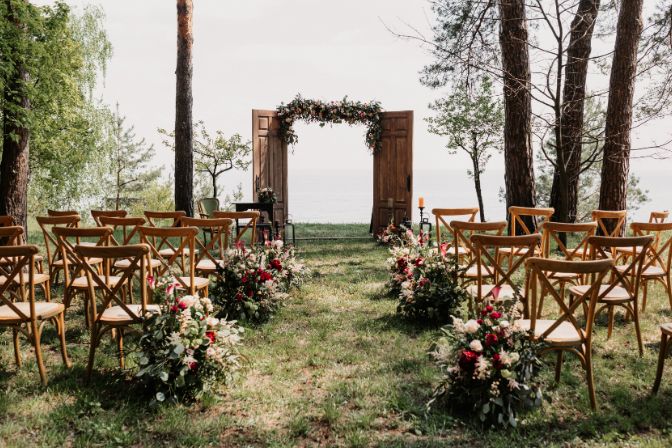 Ceremony, arch, wedding arch, wedding, wedding moment, decorations, decor, wedding decorations, flowers, chairs, outdoor ceremony in the open air, bouquets of flowers. Event planning business article.
