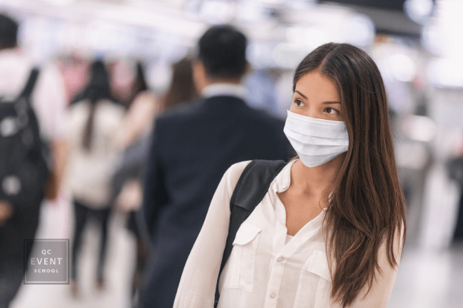 Virus mask Asian woman travel wearing face protection in prevention for coronavirus in China. Lady walking in public space bus station or airport.