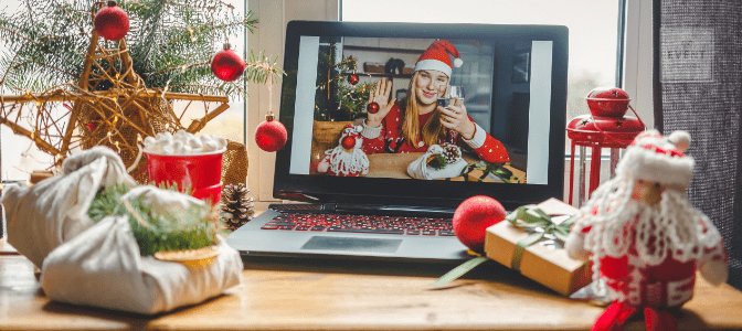 virtual party planning celebrating holiday party over laptop