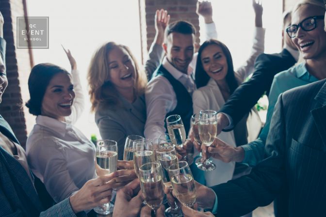 Close up photo of large big company of people having fun in office drinking golden beverage glad to have christmas holidays cheers all dressed in formal wear jackets shirts suits