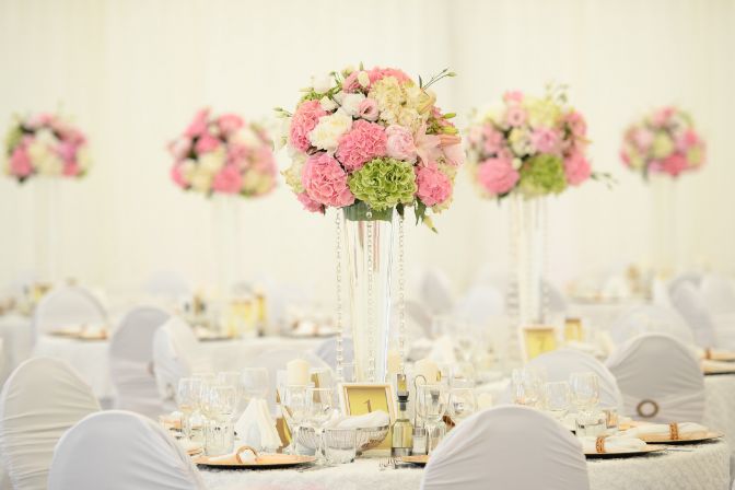 Beautiful flowers on table in wedding day. Wedding decor article.
